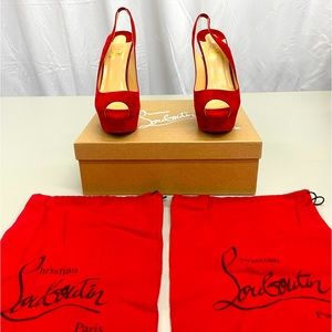 Christian Louboutin red peep toe. Brand new. Never worn.
